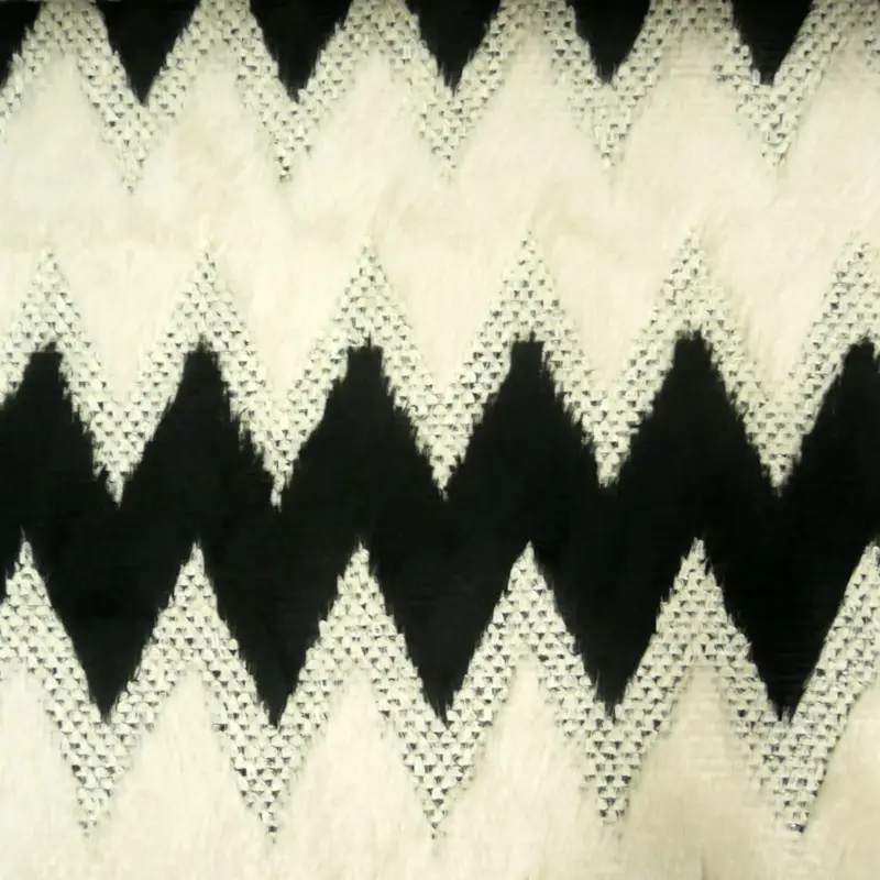 Strickstoff Fellstoff Zacken schwarz creme 1,45m Breite Bestseller