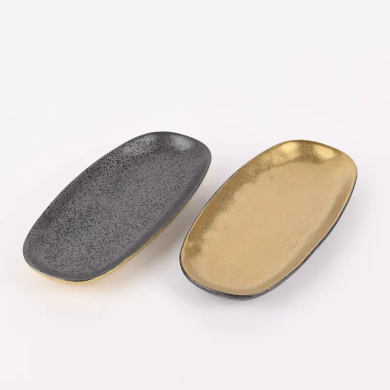 Neue Ware Kleiner Teller oval Glamour Porzellan goldfarbig schwarz 25x11,5cm versch. Varianten