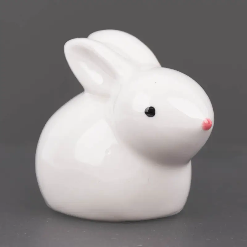 Bestpreis Dekofigur Hase hockend aus Porzellan weiß 6x4x5cm von Rico Design
