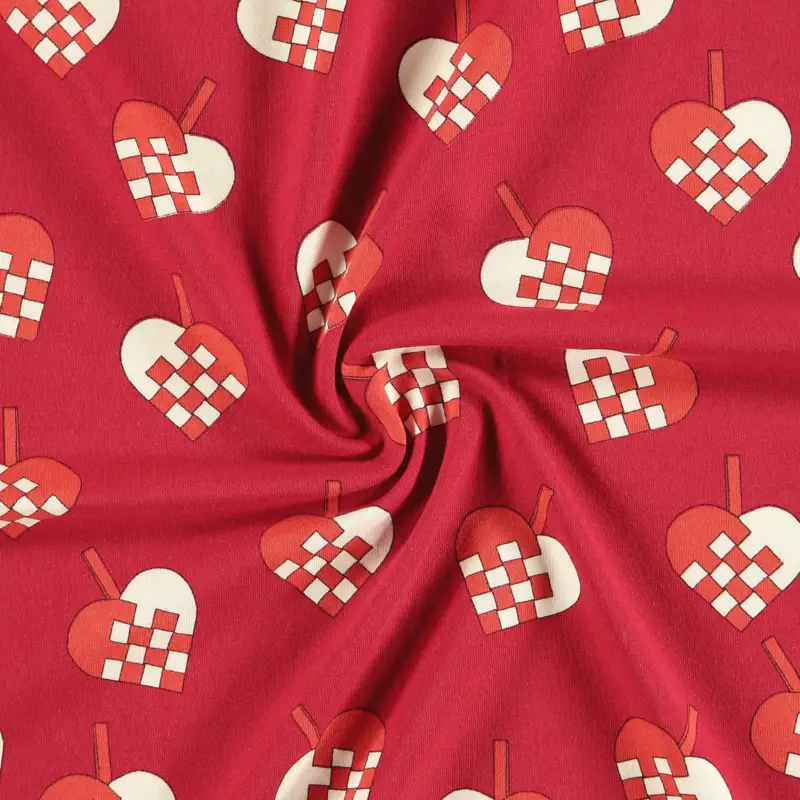 Billig Stretchjersey aus 92% Bio Baumwolle rot mit geflochtenem Weihnachtsherz