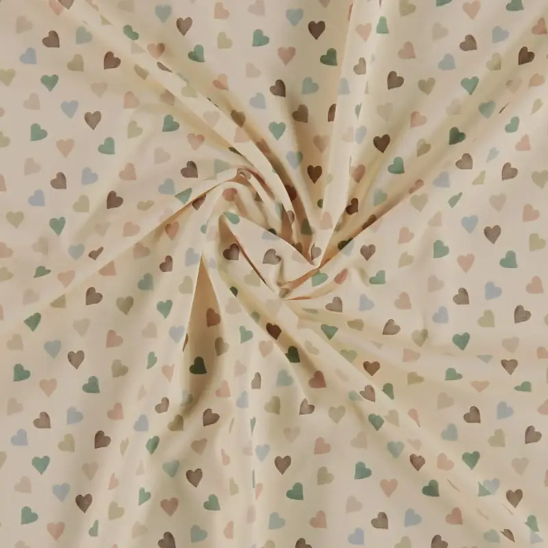 Baumwolljersey mit Stretch, sand mit Herzen Geprüft